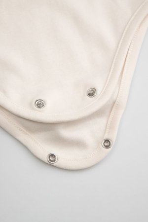 COCCODRILLO bodijs ar garām piedurknēm, smilšu krāsa, izmērs 